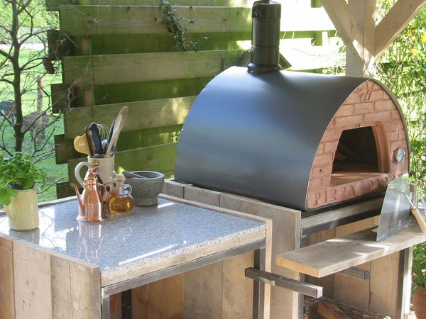 Buitenkeuken van Stoer hout en metaal! Buitenkeuken van Stoer hout en metaal!